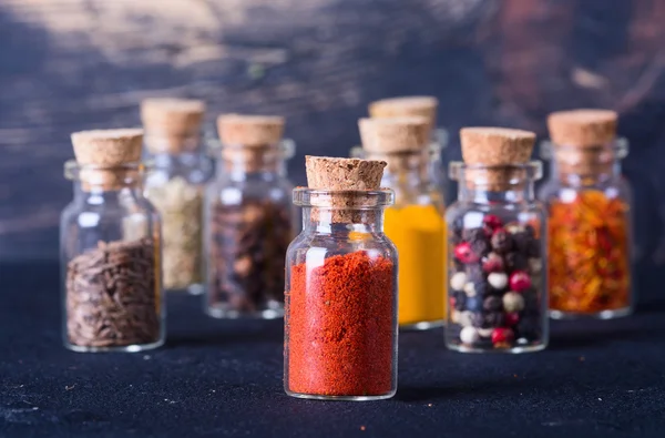 Spices in bottles — Stock Photo, Image