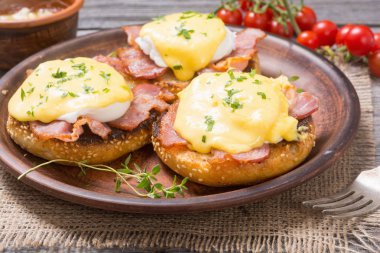 Eggs benedict with bacon clipart