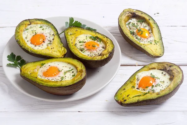 Baked avocado with eggs