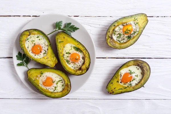 Baked avocado with eggs