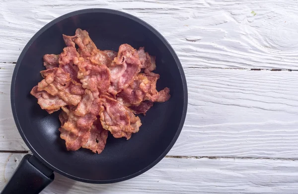 Sliced fried bacon — Stock Photo, Image