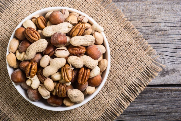 Mix of nuts in plate — Stock Photo, Image