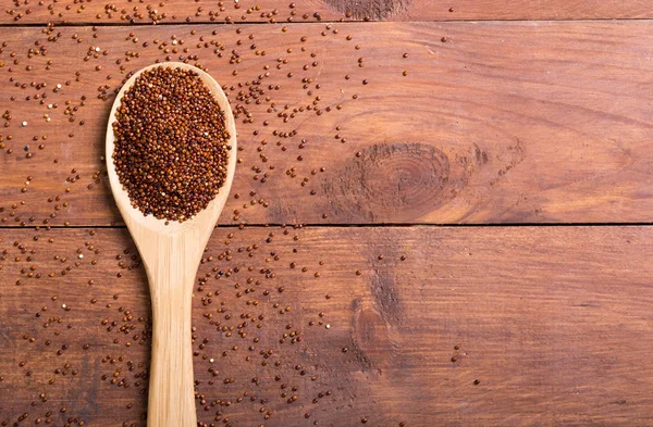 Red quinoa in spoon — Stock Photo, Image