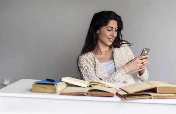 Happy Young Woman Studying Home Reading Text Message Her Mobile — стоковое фото