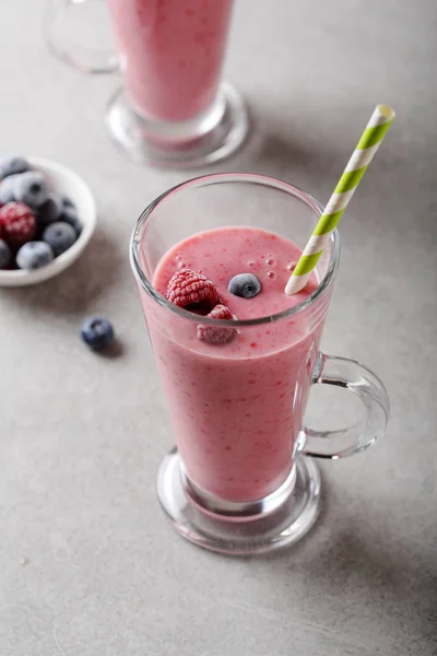 Berry smoothie on concrete background — Stock Photo, Image