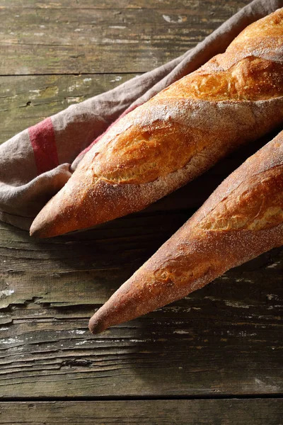 Breads on rustic backdrop — Stock Photo, Image