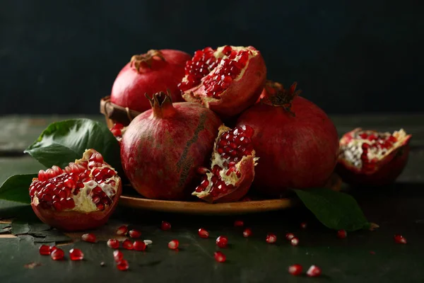 Sweet pomegranates on plate — Stock Photo, Image