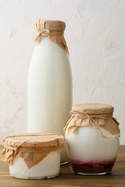 Dairy products on wood table — Stock Photo, Image