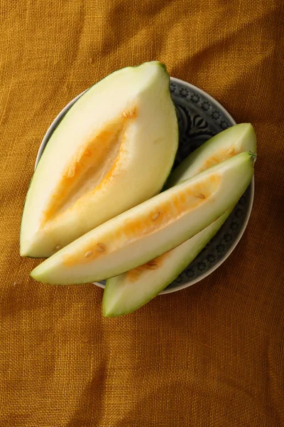 Melon owoc na talerzu — Zdjęcie stockowe