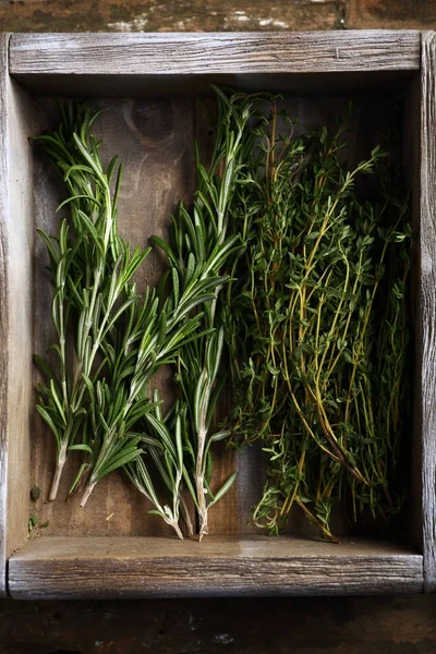 Rosemary and thyme in crate — Stock Photo, Image