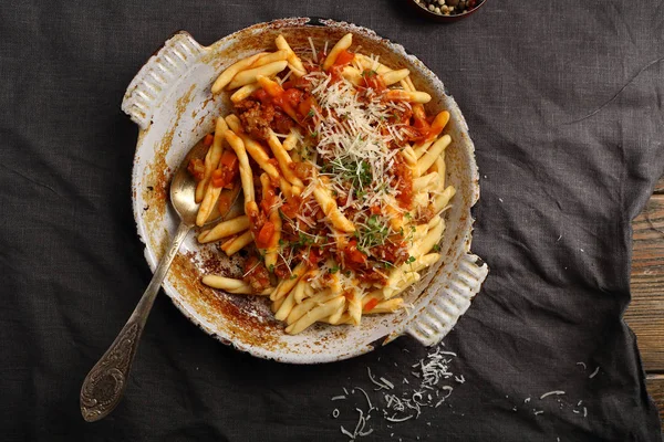 Bolognese pasta with cheese in pan — Stock Photo, Image