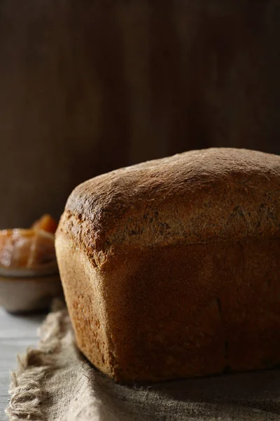 Fresh rustic rye bread on board — Stock Photo, Image