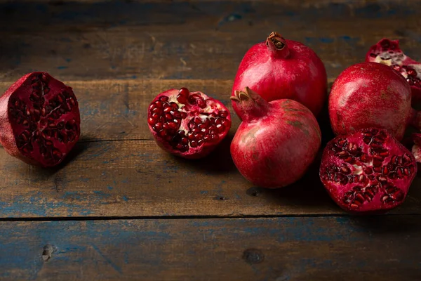 Red Ripe Pomegranates Wooden Table — Stock Photo, Image