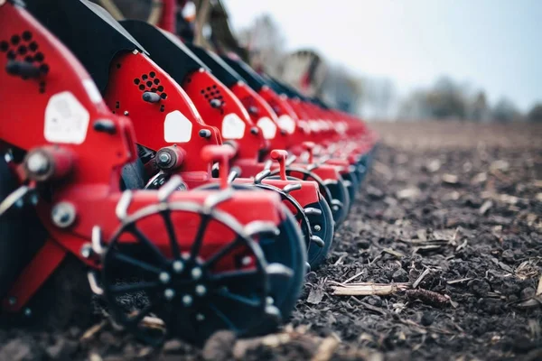 Seeders work in the field on the ground in the spring — Stock Photo, Image