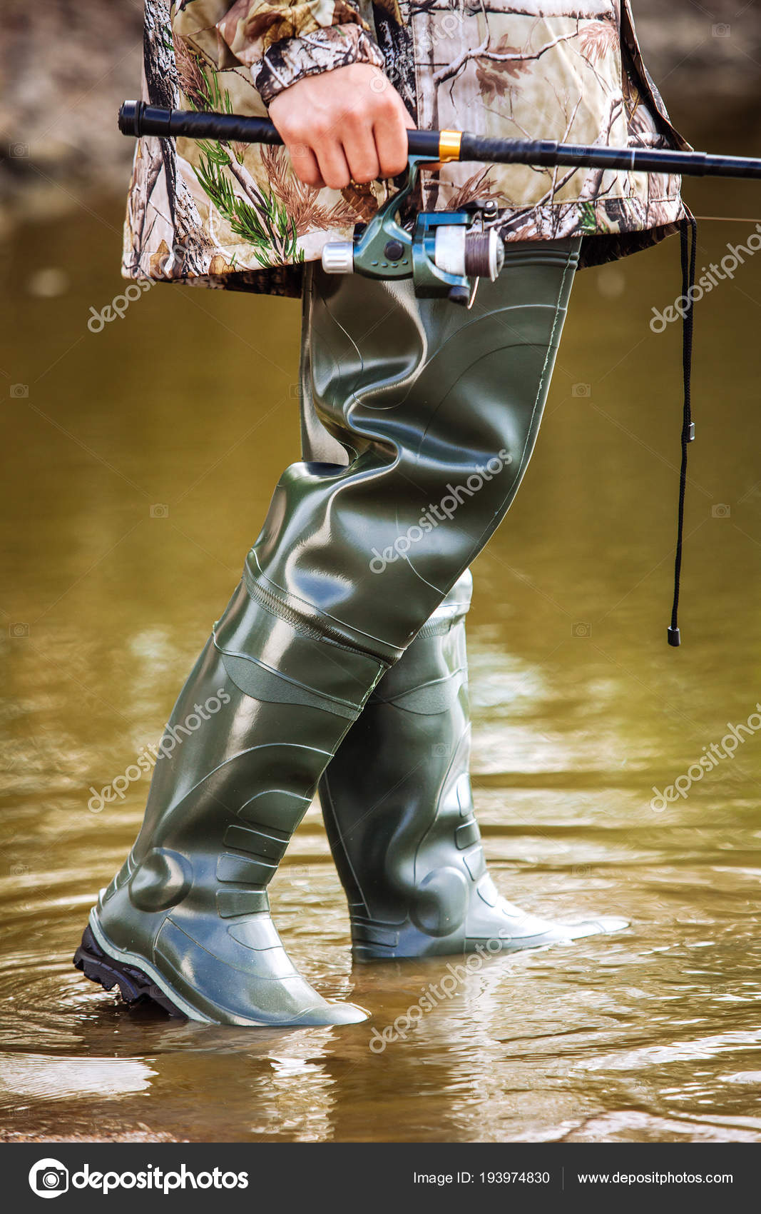 Fisherman Stands Rubber Boots Swamp River Holds Fishing Rod His — Stock  Photo © style-photo #193974830