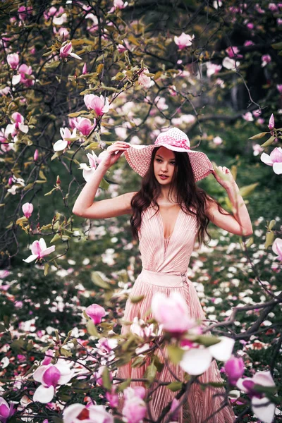 Girl Holds Hat Hands Looks Camera Flowering Garden — Stockfoto