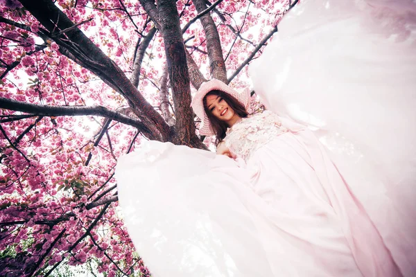 Young Girl Stands Background Blossoming Tree Spring Lush Dress — Stok fotoğraf