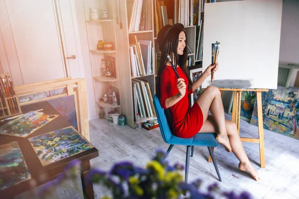 Artist Girl Red Dress Sitting Chair Studio — Stock Photo, Image