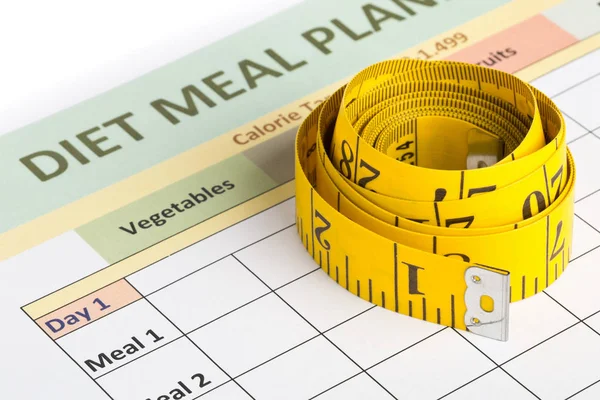 Dieta concepto de pérdida de peso - cinta métrica en la planificación de comidas — Foto de Stock