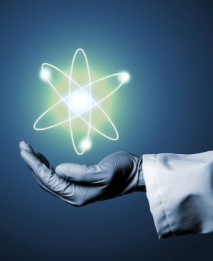 Araştırmacı veya lastik eldiven parlayan atom m holding ile bilim adamı