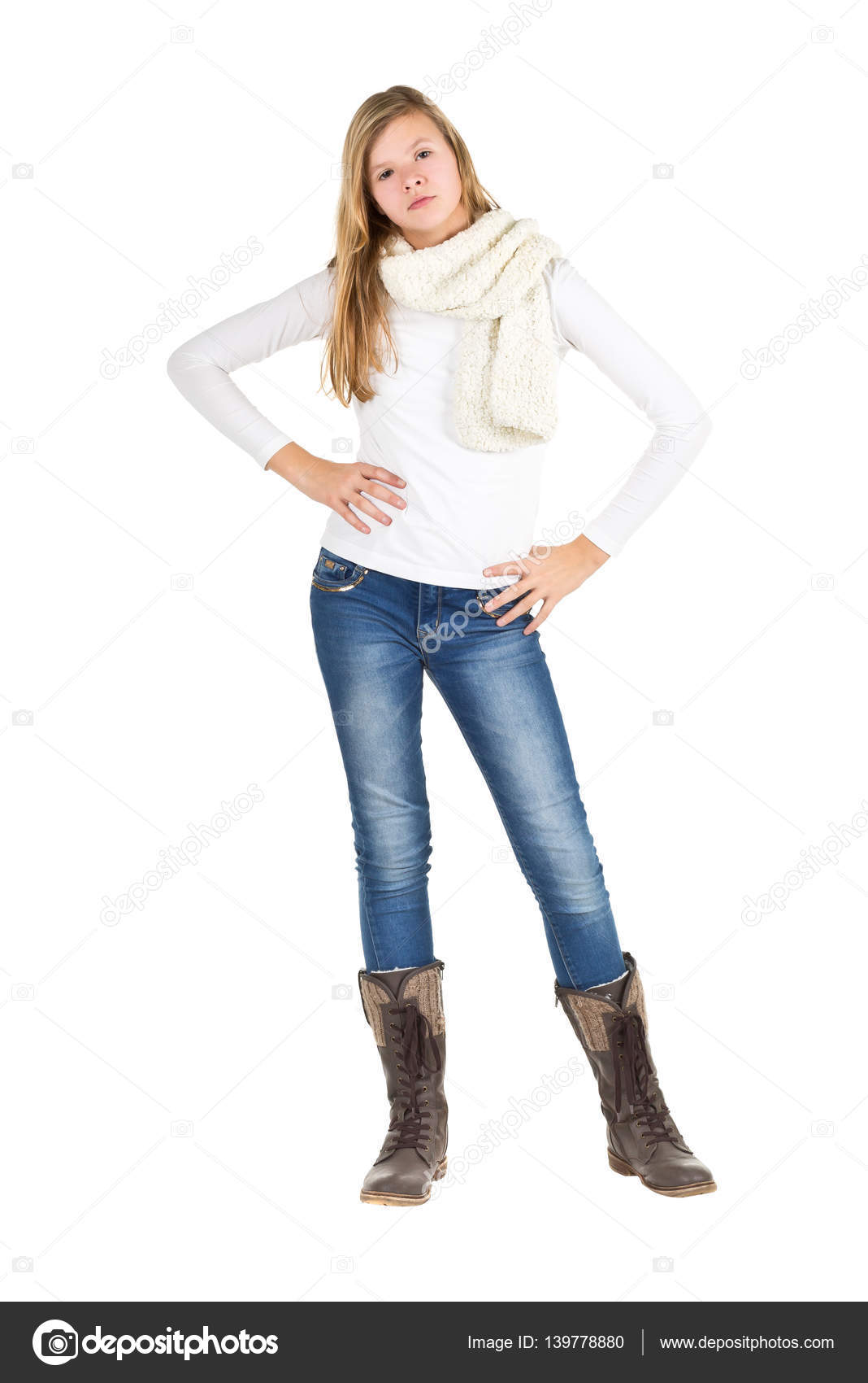 Young girl with blue jeans, winter jacket and boots standing pos Stock  Photo by ©shawn_hempel 139778880
