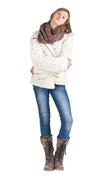 Young girl with blue jeans, winter jacket and boots standing pos — Stock Photo, Image