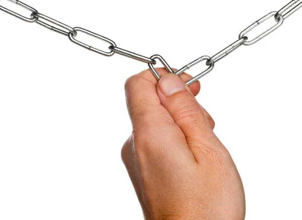 Hand holding together broken ends of two chains — Stock Photo, Image