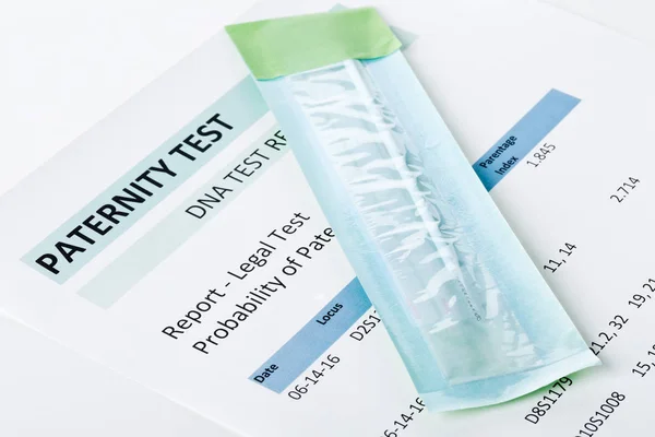 Paternity test result form with buccal swab — Stock Photo, Image