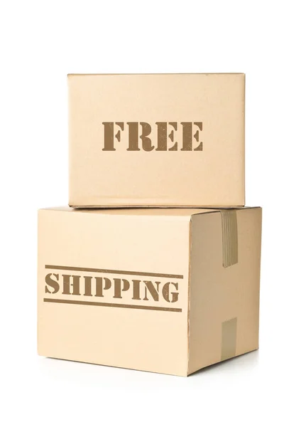 两个纸箱包裹与免费送货的印记 — 图库照片