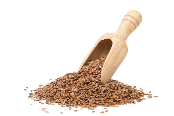 Surowe, nieprzetworzone lniany lub nasion lnu w drewniana miarka — Zdjęcie stockowe