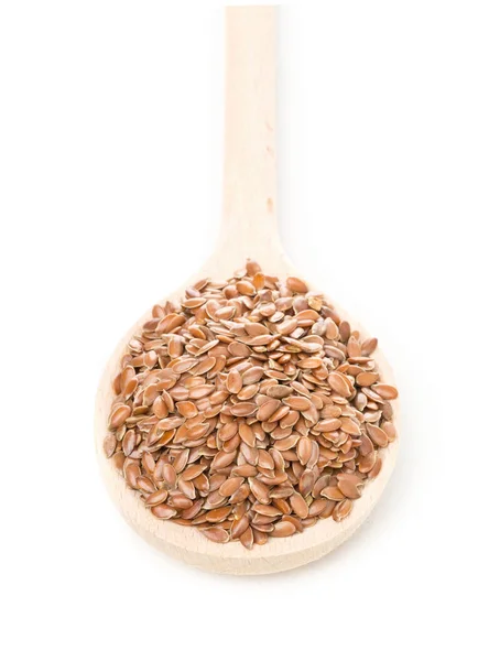 Raw, unprocessed linseed or flax seed in wooden spoon — Stock Photo, Image