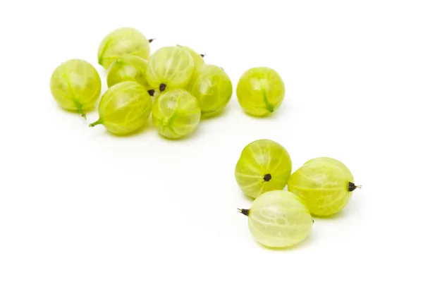 Hromadu ovoce zralé, čerstvé zelené sklizené angrešt — Stock fotografie