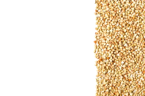Raw, natural, uncooked buckwheat seed kernels border frame — Stock Photo, Image