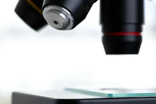 Close up of microscope with sample in lab — Stock Photo, Image