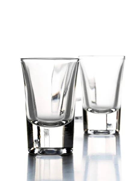 Row of empty shot glasses — Stock Photo, Image