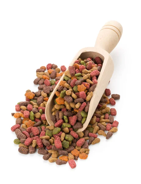 Heap of dry pet food in wooden scoop — Stock Photo, Image