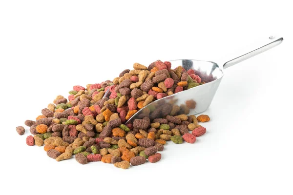 Heap of dry pet food in metal scoop — Stock Photo, Image