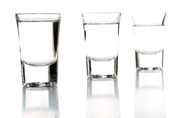 German hard liquor Korn Schnapps in shot glasses — Stock Photo, Image