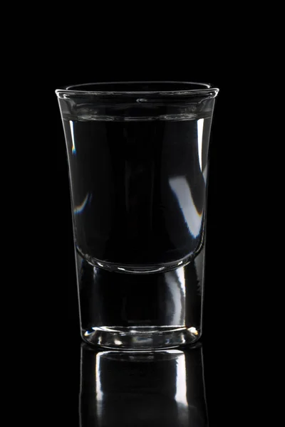 German hard liquor Korn Schnapps in shot glass — Stock Photo, Image