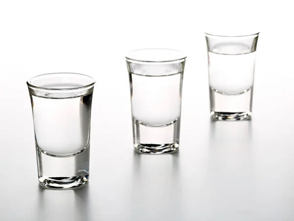 German hard liquor Korn Schnapps in shot glasses — Stock Photo, Image
