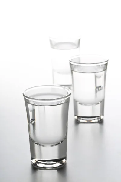 German hard liquor Korn Schnapps in shot glasses — Stock Photo, Image