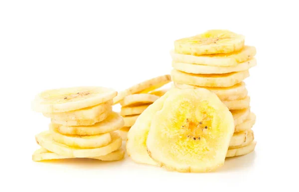 Snack de chips de plátano secos apilados sobre blanco —  Fotos de Stock