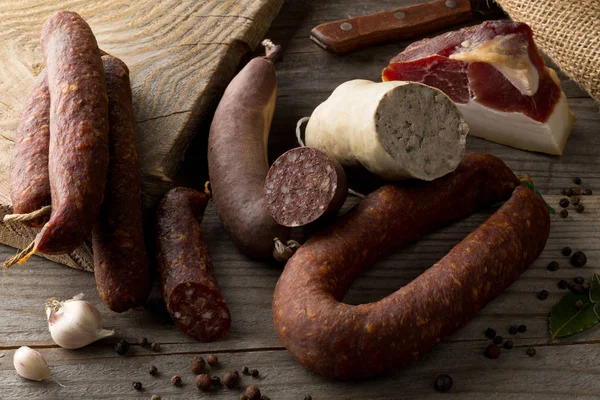 Assortment of german sausage specialties on kitchen table