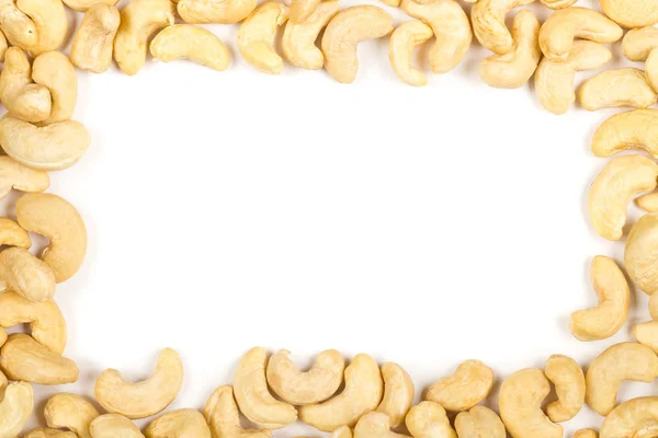 Rahmen Aus Rohen Organischen Ganzen Cashewnusskernen Auf Weißem Hintergrund — Stockfoto