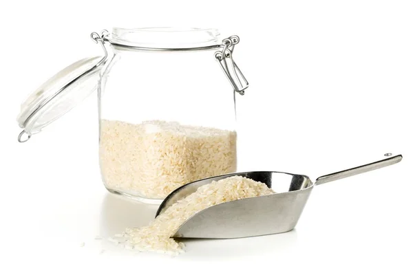 Branco não cozido, arroz cru de grão longo em jarra de armazenamento de vidro — Fotografia de Stock