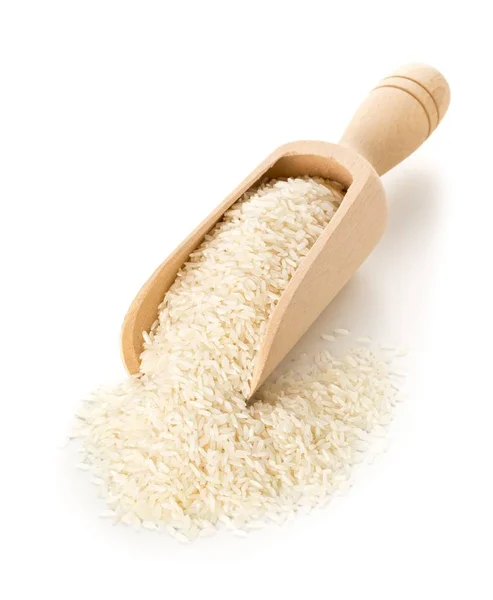 Heap of white uncooked, raw long grain rice in wooden scoop — Stock Photo, Image