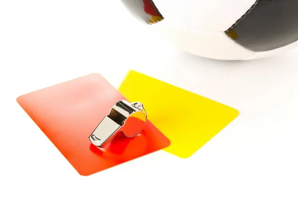 Soccer sports referee yellow and red cards and whistle with soccer ball on white background — Stock Photo, Image