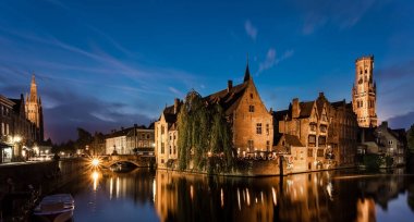 Bruges is a beautiful and characteristic town in Flanders (Belgium). The view in a gloomy atmosphere due to the bad weather keeps its charm and character in its historical architecture. clipart