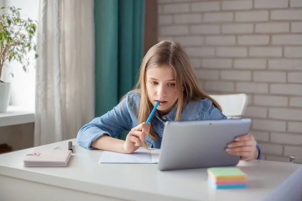 Cute Girl Does Her Homework Using Tablet Self Isolation While — Stock Photo, Image