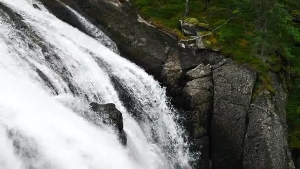 Waterfall in mountains of Norway in rainy weather. — Stock Video